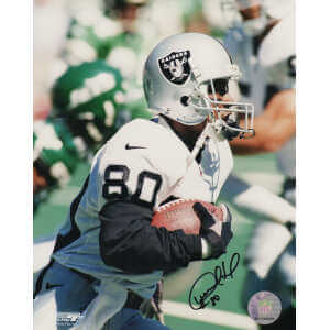 Desmond Howard Signed Raiders White Jersey Close Up With Football 8x10 Photo